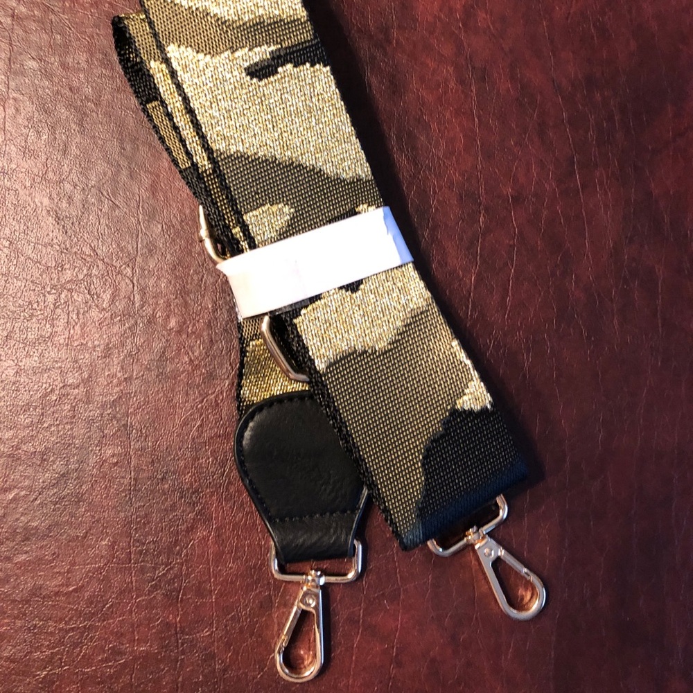 Ah-dorned guitar strap